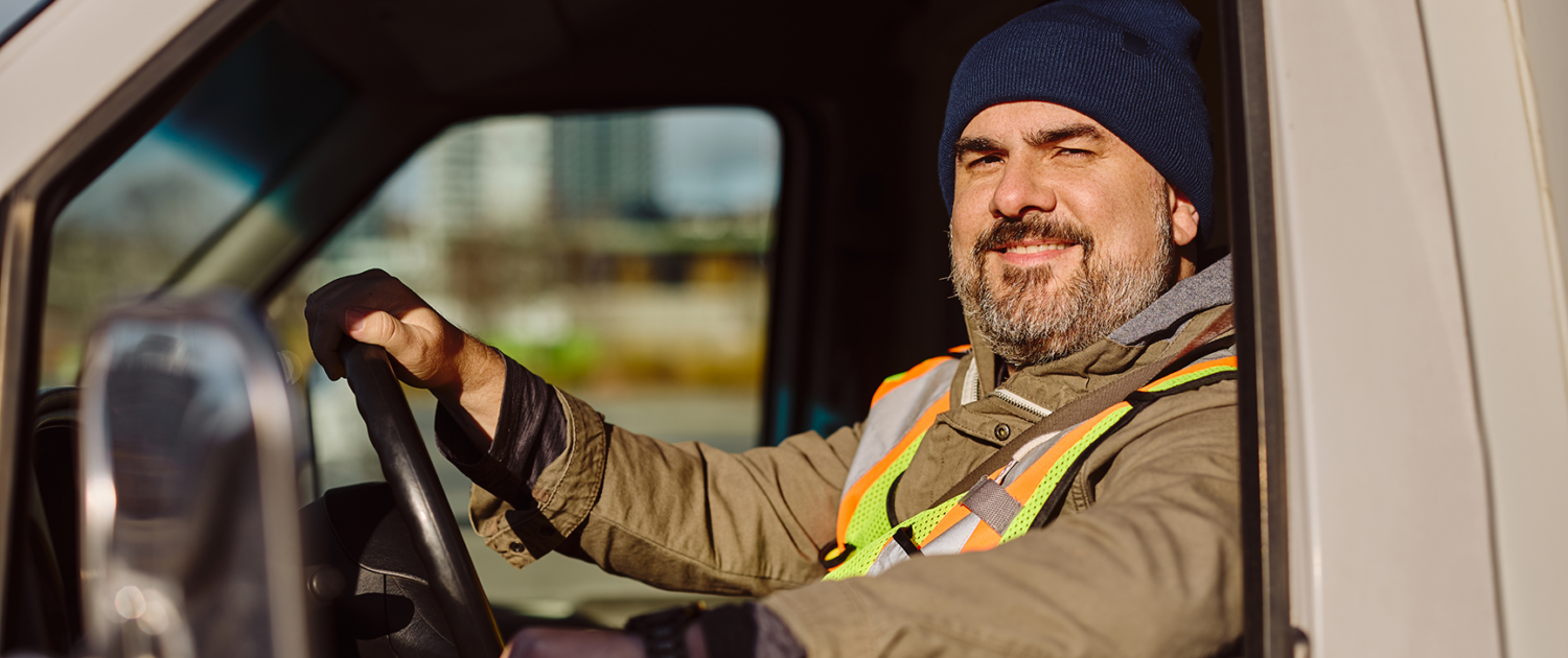 A person with a CDL license driving a commercial vehicle.